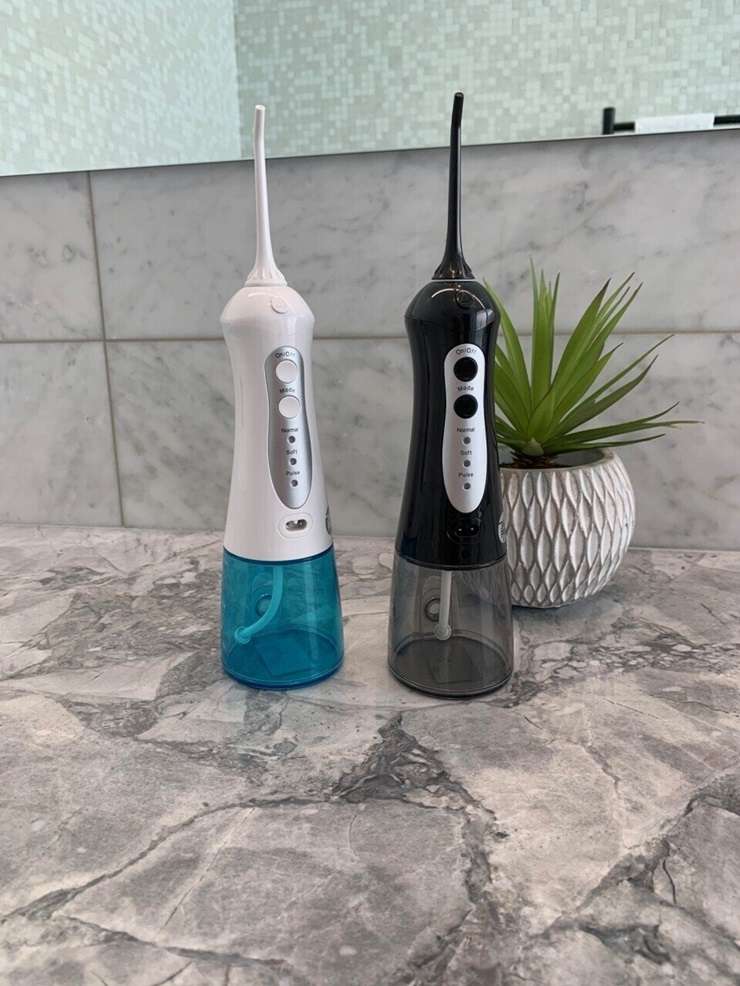 Worth the splash? We put water flossers to the dental test. Artwork / Beth Walsh