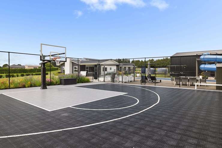 The lifestyle property at 74D Walter Henry Drive, in Omanawa, Bay of Plenty has a 36m hydroslide, a basketball court and a brand new shed. Photo / Supplied