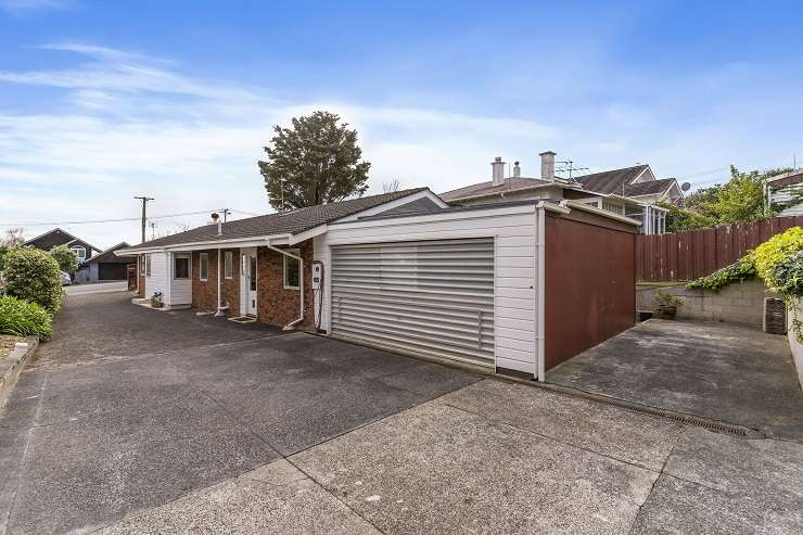 cream brick and tile house with lawn in front  5 Carlingford Drive, East Tamaki, Auckland