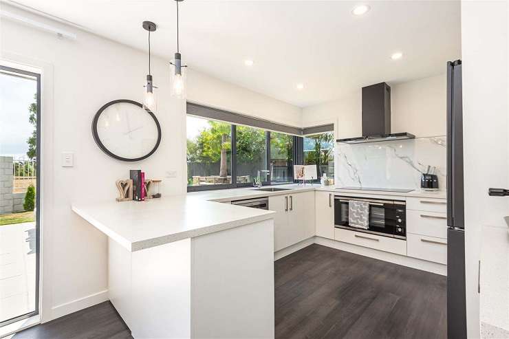 The owners of this Chilwell Place property, in Christchurch, had carried out a stunning <img00,000 renovation before taking it to market. Photo / Supplied