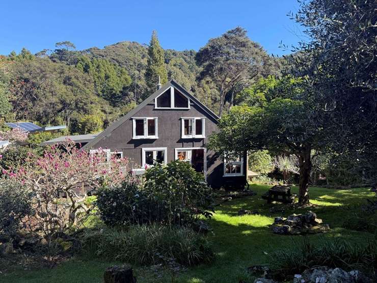 A rundown cottage on Blind Bay Road, on Great Barrier Island, is being sold