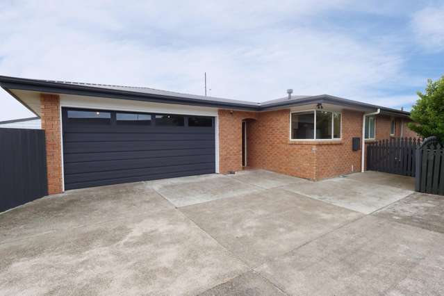 Private, Easy-Care Living with Double Garaging!