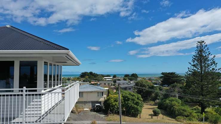 Darren Harrison's unusual home at 112 Kahukura Avenue, in Waitarere Beach, has been a labour of love. Photo / Supplied