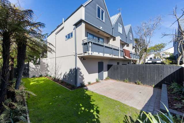 Private Corner Unit with a Courtyard & Garage
