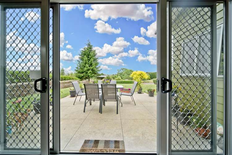 Deck and garden outlook at 1/625 Peacockes Road · archived listing