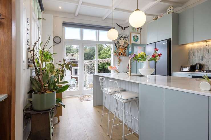 Vendors Erin and Christian Jensen with Love It Or List It hosts Paul Glover and Alex Walls. Walls transformed their three-bedroom bungalow on Koromiko Street, in Auckland's New Lynn. Photo / TVNZ