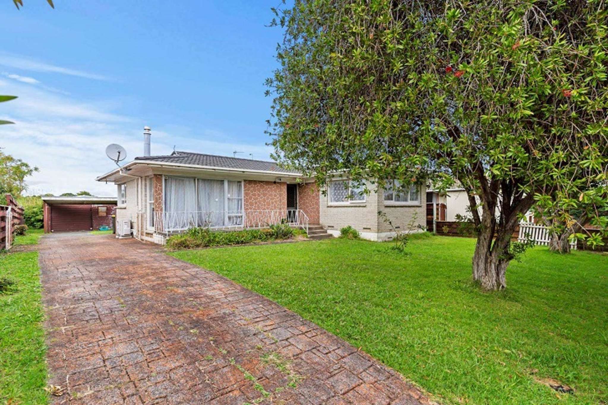 Hot property: Brick and tile do-up sells for $1.8m after six bidders go hard and fast