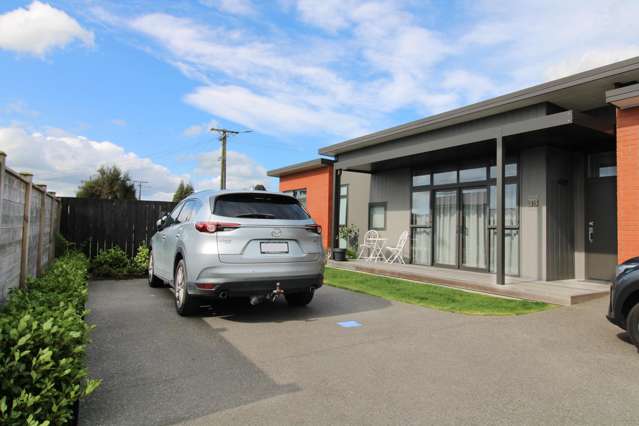 Spacious & Stylish Two-Bedroom Duplex with Internal Garage & Sunny Backyard