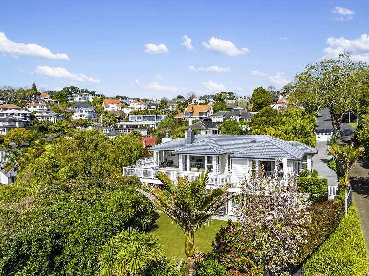 Ten bidders registered for the auction of a three-bedroom bungalow on Korokino Road, Greenlane, which sold for <img.825m. Photo / Supplied