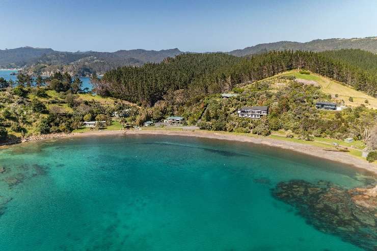 Awana Beach House, on Great Barrier Island, is typical of the high-end coastal homes that have recently hit the market. Photo / Supplied