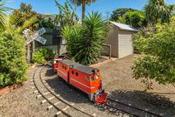 They bought a railway! Property with big kid’s train set sells to local family - and they’re keeping it