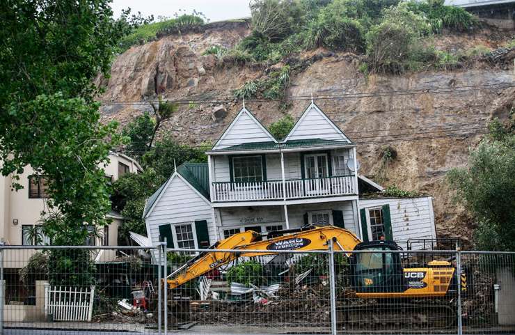 An Auckland house is red-stickered following heavy flooding. Photo / Getty Images