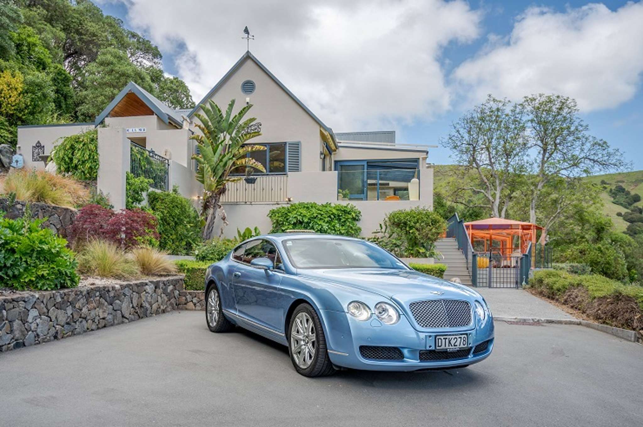 Aussie owner ups the stakes: Luxury Akaroa retreat comes with free Bentley