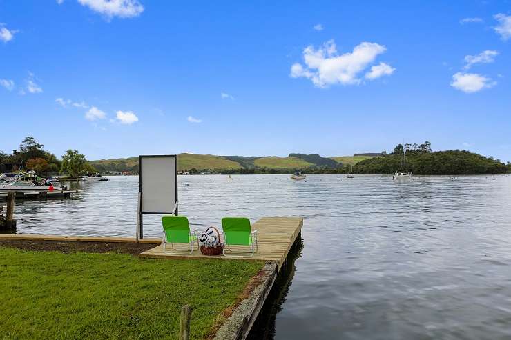 The quirky A-frame in a prime lakefront spot in Okawa Bay, Lake Rotoiti, is for sale for the first time. Photo / Supplied