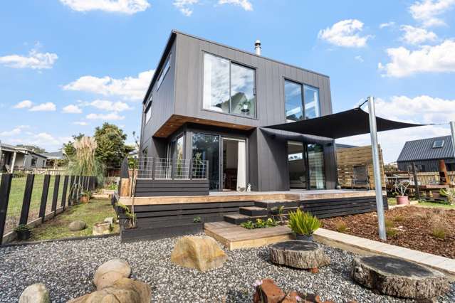 Stylish Home Living With A Lush Backdrop