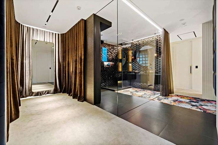 The opulent apartment cost $2m to fit out. It includes a curtain portrait of designer Karl Lagerfeld. Photo / Supplied