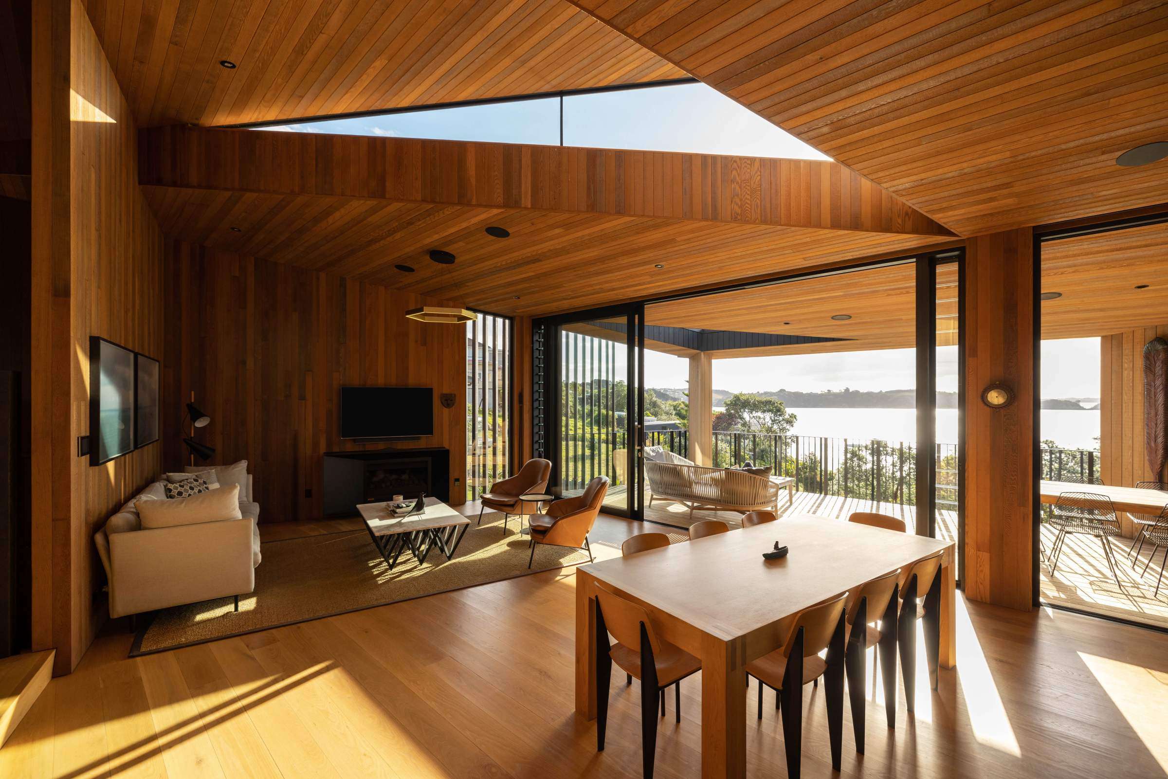 white and timber house with multiple rooves and sea view 66 Kennedy Point Road, Kennedy Point, Waiheke Island