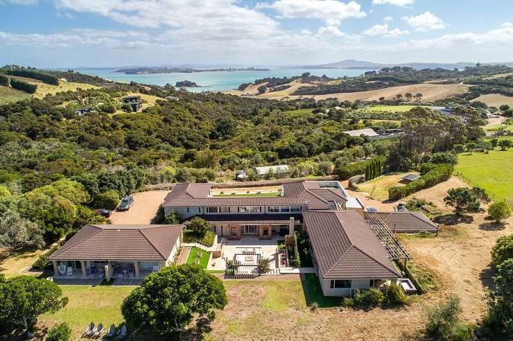 modern steel glass and cedar house with swimming pool in foreground  24 Newton Road, Oneroa, Waiheke Island, Auckland