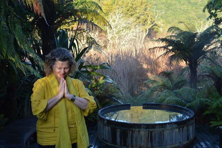 The three-bedroom, two-bathroom home at 23 Humu Street, in Tokaanu, has direct access to a stream and its own geothermal hot tub. Photo / Supplied