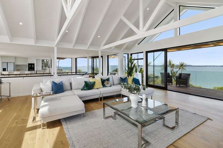 white and timber house with multiple rooves and sea view 66 Kennedy Point Road, Kennedy Point, Waiheke Island