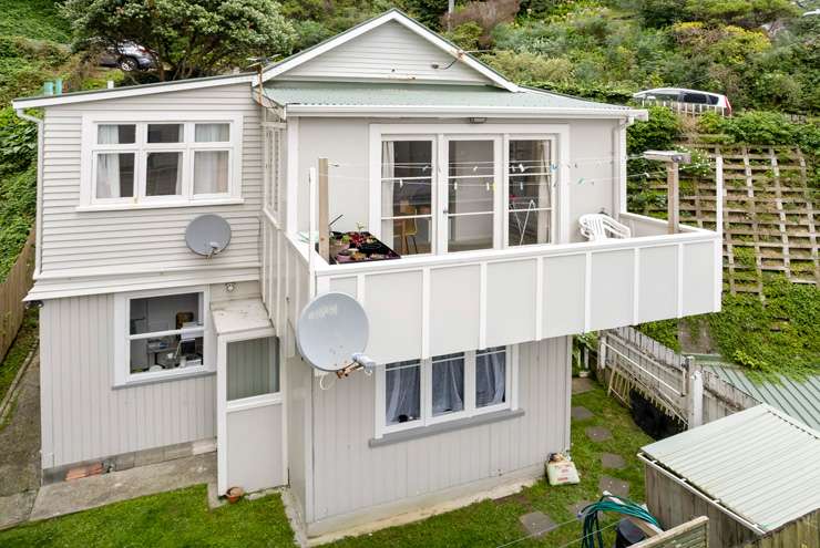 Up for grabs at 252 Oriental Parade and 1 Baring Street, in Oriental Bay, Wellington, which comprises a popular dairy and upstairs living quarters and a separate house at the back. Photo / Supplied