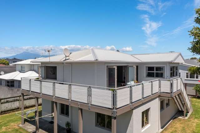 Funky Beach House with 4 car garaging