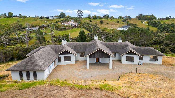 The half-built mansion at 54A Donaldson Drive, in Coatesville, Auckland, is up for grabs. Photo / Supplied