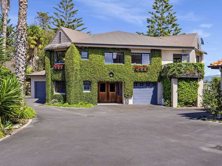 A 1960s home on a 7816sqm waterfront section in Matua is for sale for the first time in 57 years. Photo / Supplied