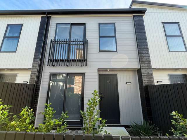 Near new townhouse in a fantastic location!
