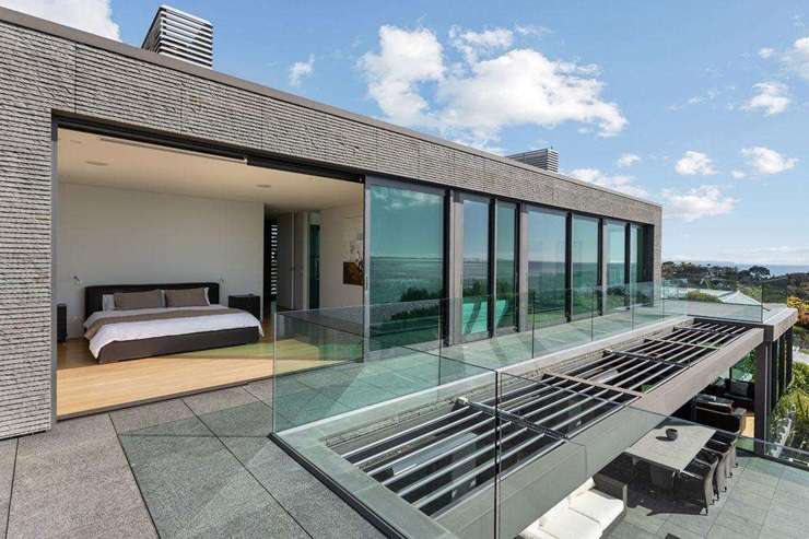 A six-bedroom waterfront mansion is up for grabs at 41 Beach Road, in Auckland's Castor Bay. Photo / Supplied.