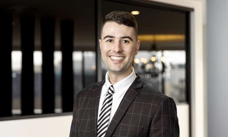 Baches line Onetangi Beach on Waiheke Island. Photo / Getty Images