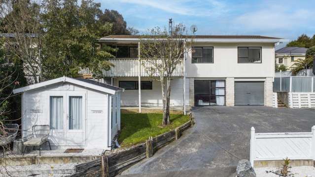 Sunny Three-Bedroom Home With Bonus Studio Unit