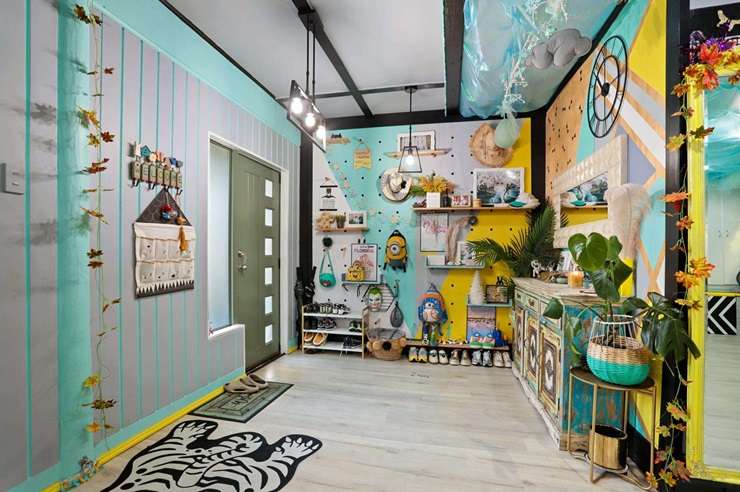 All things bright and beautiful: 221 Woodlands Park Road, in Auckland's Titirangi, heads to auction on April 18. Photo / Supplied