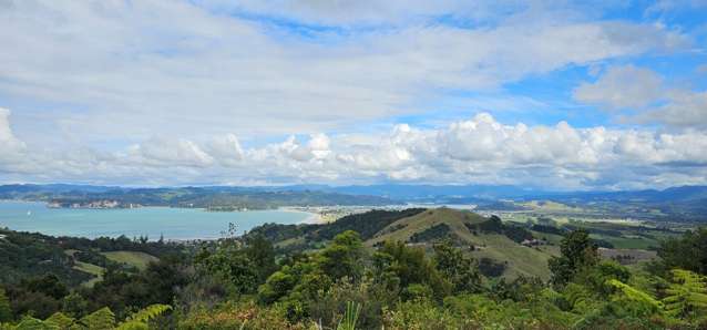 Elevated coastal paradise with panoramic views