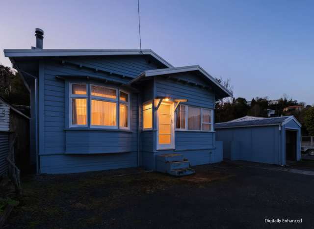 Two Bedrooms, Two Sunrooms, Great Location!