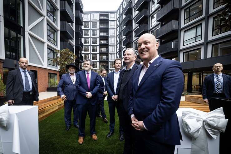 The new Resido apartment complex - three blocks of 295-unit apartments next to Auckland's Sylvia Park - is promoting itself as a pet-friendly development. Right, is one of the new residents, Lily. Photo / Jason Oxenham, Supplied