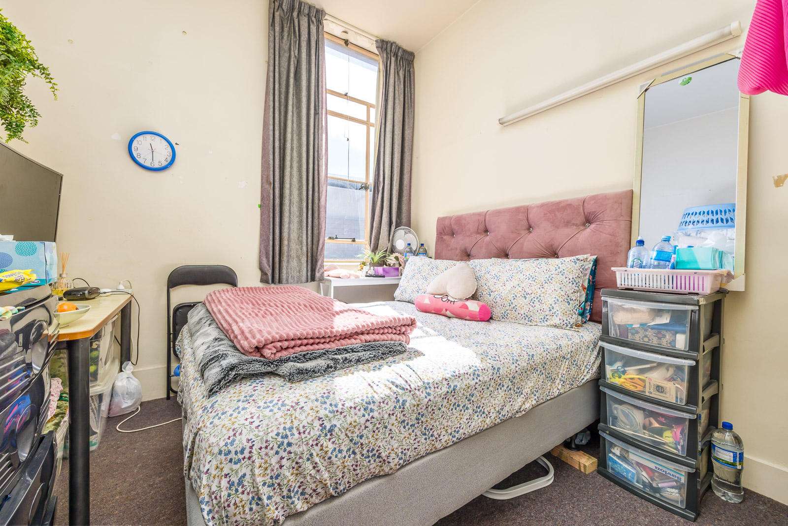 A three-bedroom, one-bathroom apartment in Grand Central, in Central Auckland, is to be sold at a <img reserve auction on Thursday. Photo / Supplied