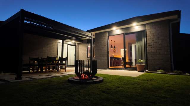 A standout home with triple garaging