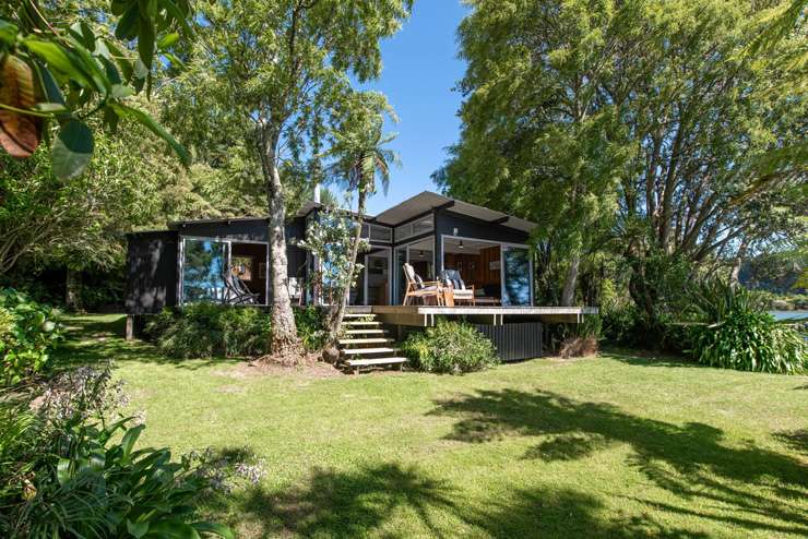 This 1930s cottage on Lake Rotoiti was in hot demand at auction last week. Photo / Supplied