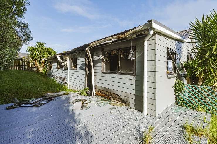 The fire-damaged house on Derrimore Heights, in Clover Park, is already attracting interest from people wanting to make a quick buck. Photo / Supplied