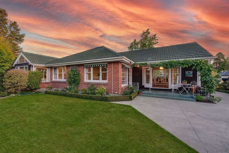 A 1950s classic brick house on Wai-iti Terrace, in Fendalton, saw more people through its first weekend of open homes than most houses see during an entire auction campaign. Photo / Supplied