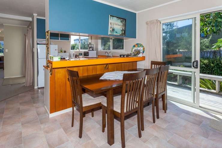 Ray White agent Jayne Kiely is taking her bach at 416 Rangi Avenue, in Whangamata, to auction. Photo / Supplied