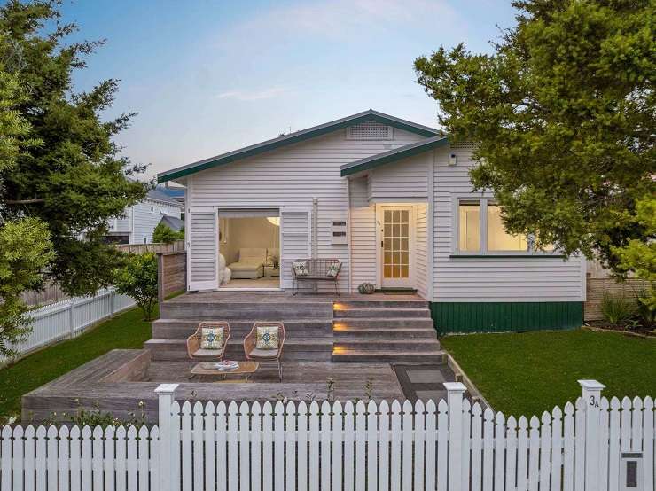 white modernist house with pool and hedges 306 Victoria Avenue Remuera