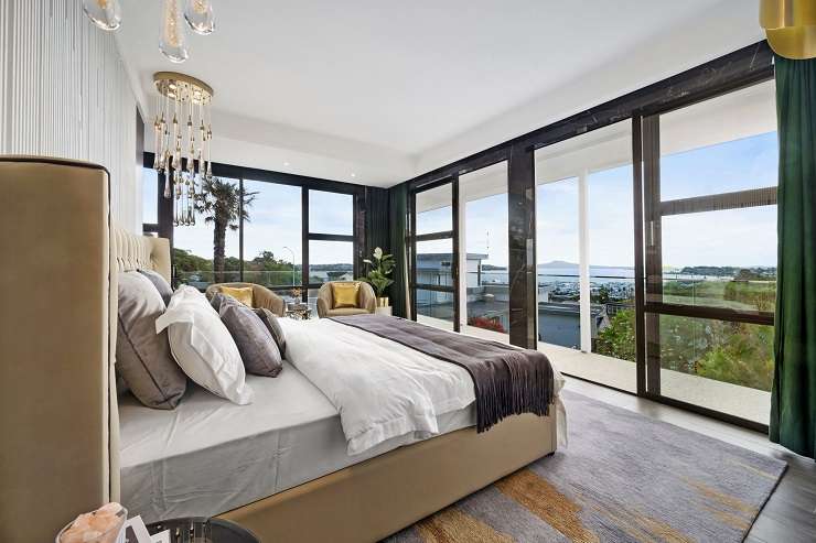 living room with black and white rug marble walls  24 Half Moon Rise, Half Moon Bay, Auckland