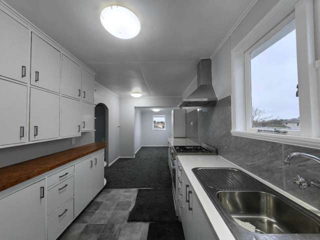 Upstairs Unit – Low-Maintenance