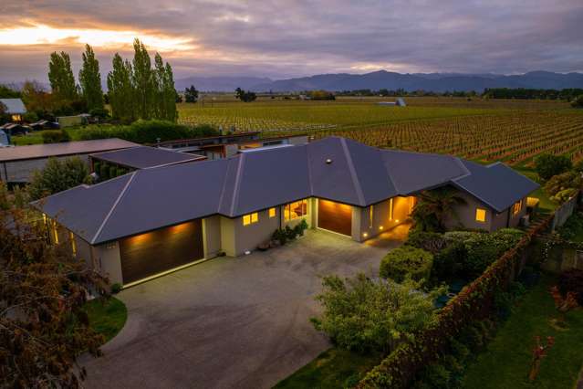 Rural views with triple car garaging