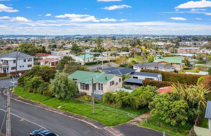 This three-bedroom house on Don Buck Road, in Massey, Auckland sold for $990,000. Photo / Supplied