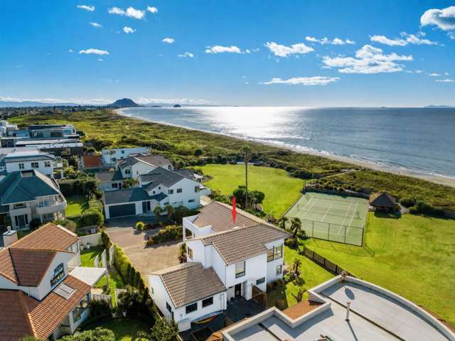 Sweeping views, beachfront living