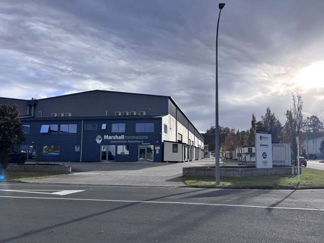Large modern warehouse on corner site