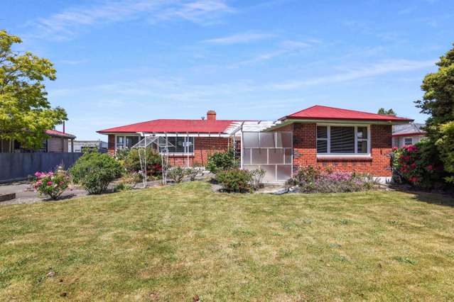 Three Bedroom Home with Garage, Carport & Easy-Care Section